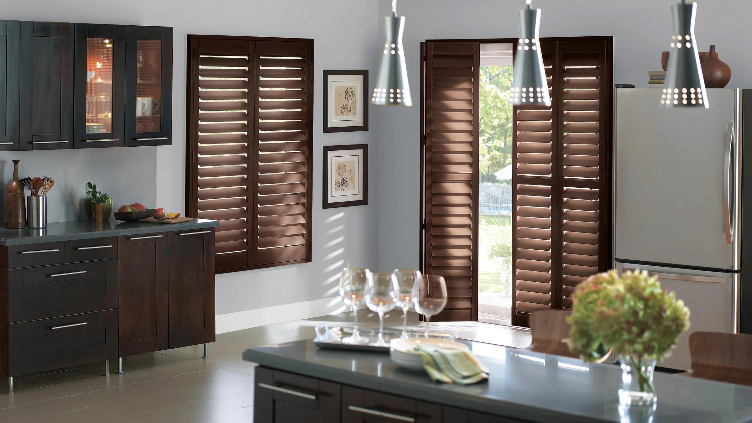 Dark wood shutters adding contrast to a modern kitchen