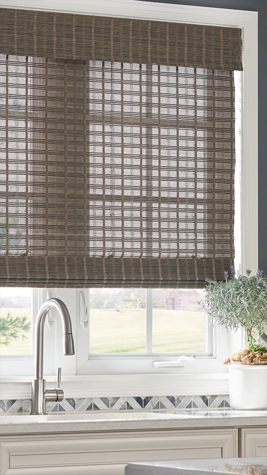 Close view of a fitted natural woven shade and its layered texture